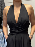 Tuta con scollatura elegante