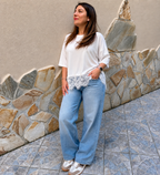 Maglia over bianca con dettaglio in pizzo